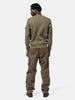 Back shot of the model wearing the Stone Island Organic Cotton Waffle Fleece Crewneck Military Green