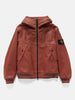 Flat shot of the Stone Island Textured Leather Hooded Jacket Brick Red