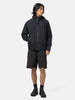 Full body shot of the model wearing the Veilance Secant SL Jacket M Black
