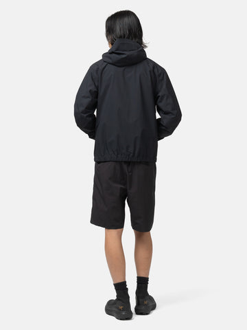 Back-shot of the model wearing the Veilance Secant SL Jacket M Black