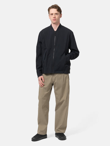 Full body shot of the model wearing the Veilance Spere Cargo Pant Lt Gnosis