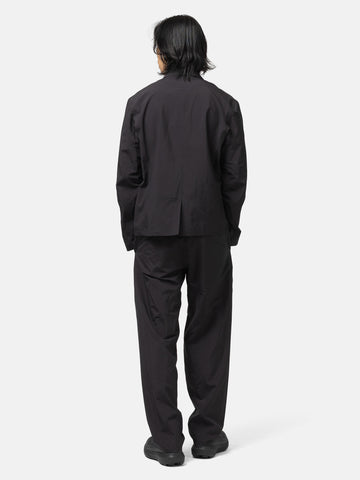 Back shot of the model wearing the Veilance Spere SL Blazer M Black