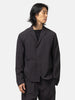 Half body shot of the model wearing the Veilance Spere SL Blazer M Black