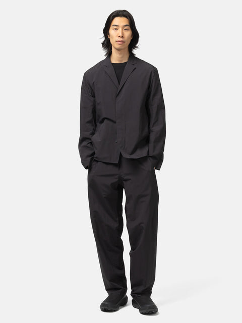 Full body shot of the model wearing the Veilance Spere SL Pant M Black
