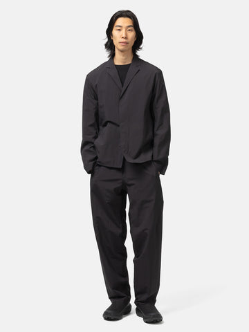 Full body shot of the model wearing the Veilance Spere SL Pant M Black