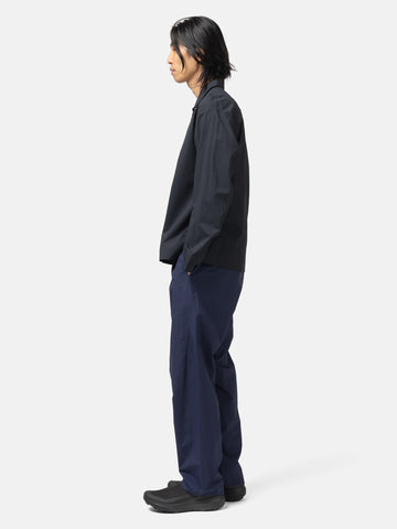 Side shot of the model wearing the Veilance Spere SL Pant M Passport