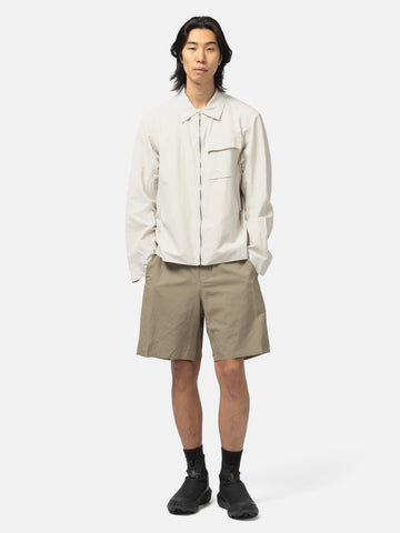 Full body shot of the model wearing the Veilance Spere SL Short M Lt Gnosis