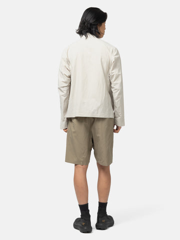 Back shot of the model wearing the Veilance Spere SL Short M Lt Gnosis
