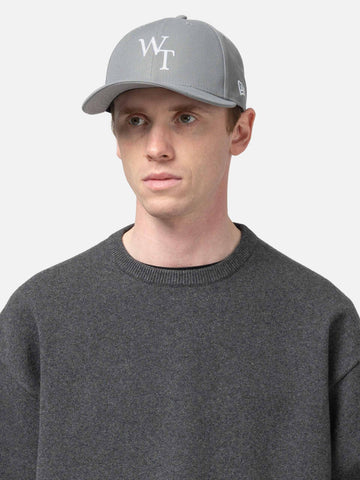 Model wearing the WTAPS 59Fifty Low Profile Cap NEW ERA Gray