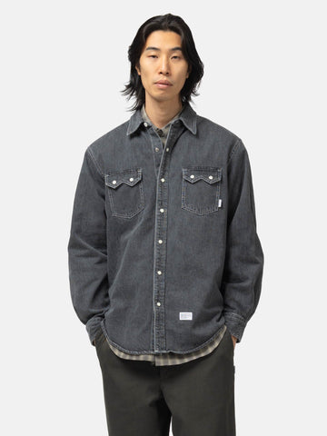 half body shot of the model wearing he WTAPS Allman / LS / Cotton. Denim Black