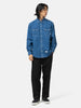 Full body shot of the model wearing the WTAPS Allman / LS / Cotton. Denim Indigo