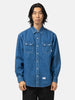 half body shot of the model wearing the WTAPS Allman / LS / Cotton. Denim Indigo