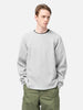 Half body shot of the Model standing in studio wearing the WTAPS KRS UPR Sweater in NYCO Gray