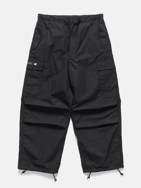 Flat shot of the WTAPS MILT9601 Trousers NYCO in Weather Black