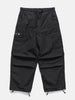 Flat shot of the WTAPS MILT9601 Trousers NYCO in Weather Black