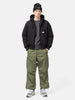 Model standing in studio wearing the WTAPS MILT9601  Trousers NYCO Weather in Olive Drab