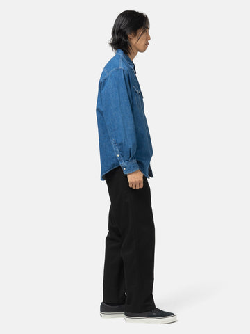 Side shot of the model wearing the WTAPS WRKT2001 / Trousers / Cotton. Twill Black