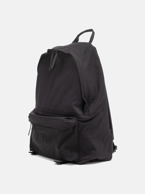 three quarter view of the HOBO Backpack 22L Nylon Oxford Onibegie Dyed Charcoal