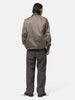 rear view of model wearing sacai cotton chino blouson gray