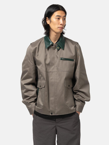 half-body view of model wearing sacai cotton chino blouson gray