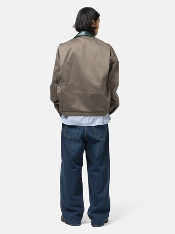 rear view of the model wearing the sacai Denim Pants Blue