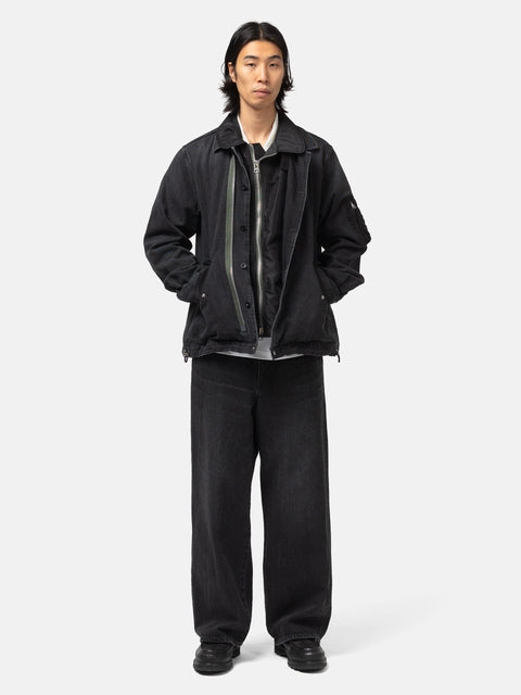 full-body view of the model wearing the sacai Denim x Nylon Twill Blouson Black