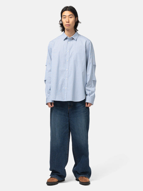 full-body view of the model wearing the sacai Poplin Shirt Blue Stripe