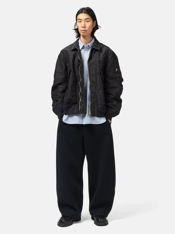 full-body view of the model the sacai Sponge Sweat Pants Black