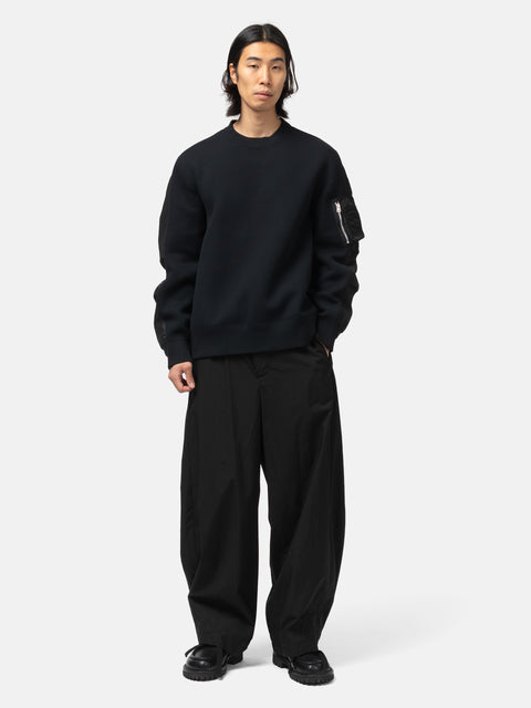 full-body  view of the model wearing the sacai Sponge Sweat Pullover Black