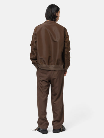 rear view of the model wearing the sacai Sponge Sweat Pullover Brown