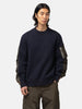 half-body view of the model wearing the sacai Sponge Sweat Pullover Navy x Khaki