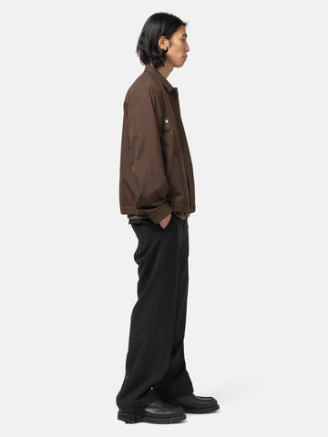 side-body view of the model wearing the sacai Suiting Pants Black