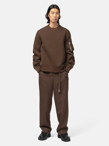 Full-body view of the model wearing the sacai Suiting Pants Brown