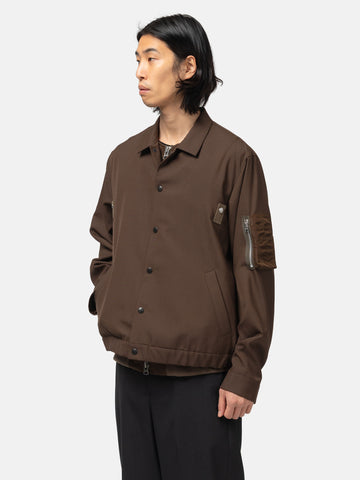 half-body view of the model wearing the sacai Suiting x Nylon Twill Blouson Brown