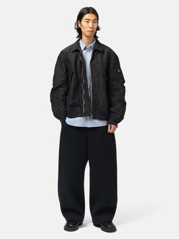 Full-body view of the model wearing the sacai Treated Nylon Twill Blouson Black