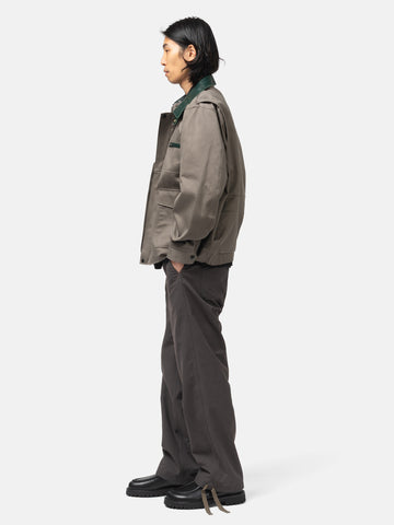 side-body of the model wearing the sacai Weathercloth Pants Khaki